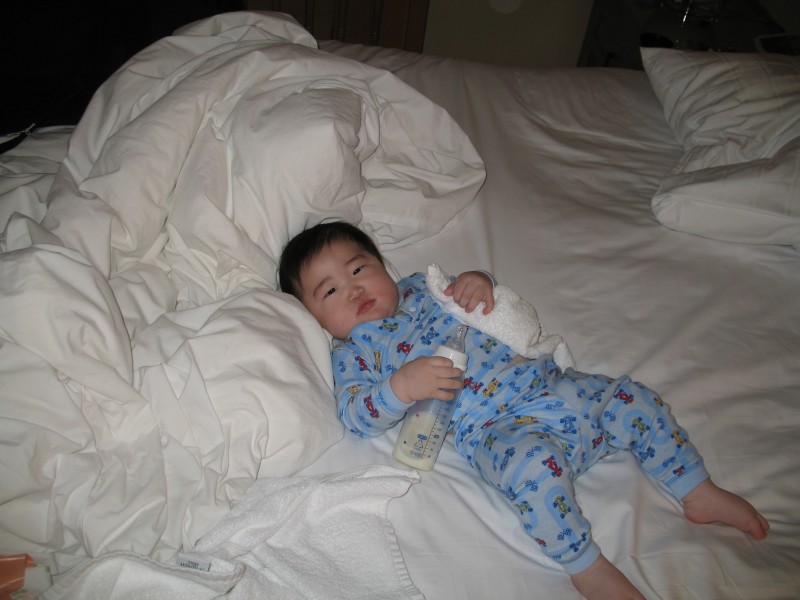 A happy boy, in the hotel in Seoul