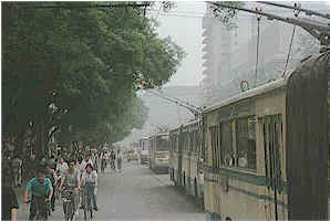 Rush Hour in Beijing - Bikes and Electric Buses