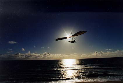 George Reeves, infamous beach pilot flying at sunset