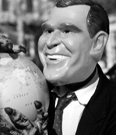 Bush grasps the globe in his talons
