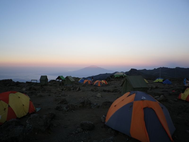 Meru in the west, sun just hitting the top of it